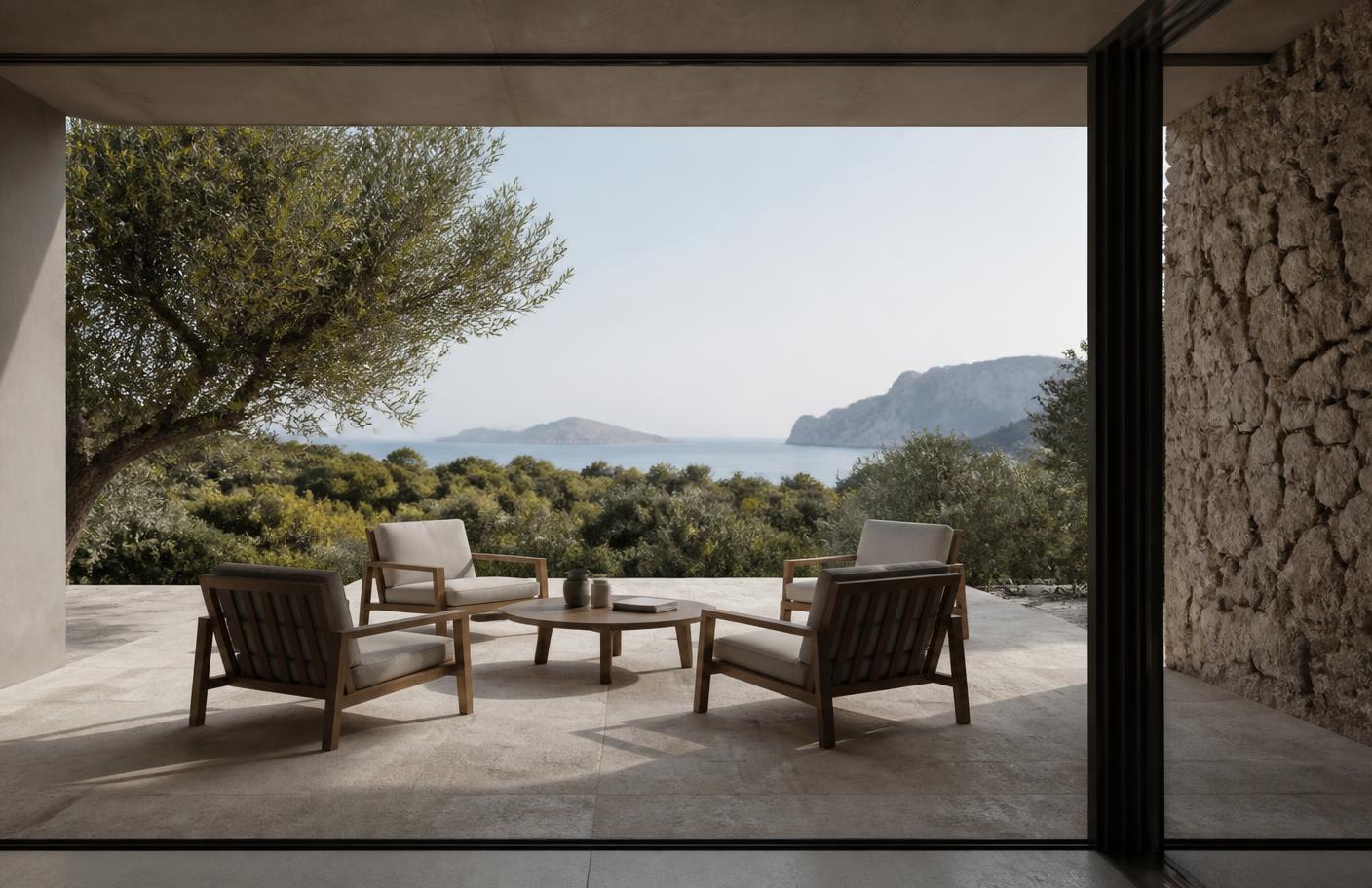 Terraza de arquitectura premium con vistas a la naturaleza mediterránea preparada para una sesión de trabajo